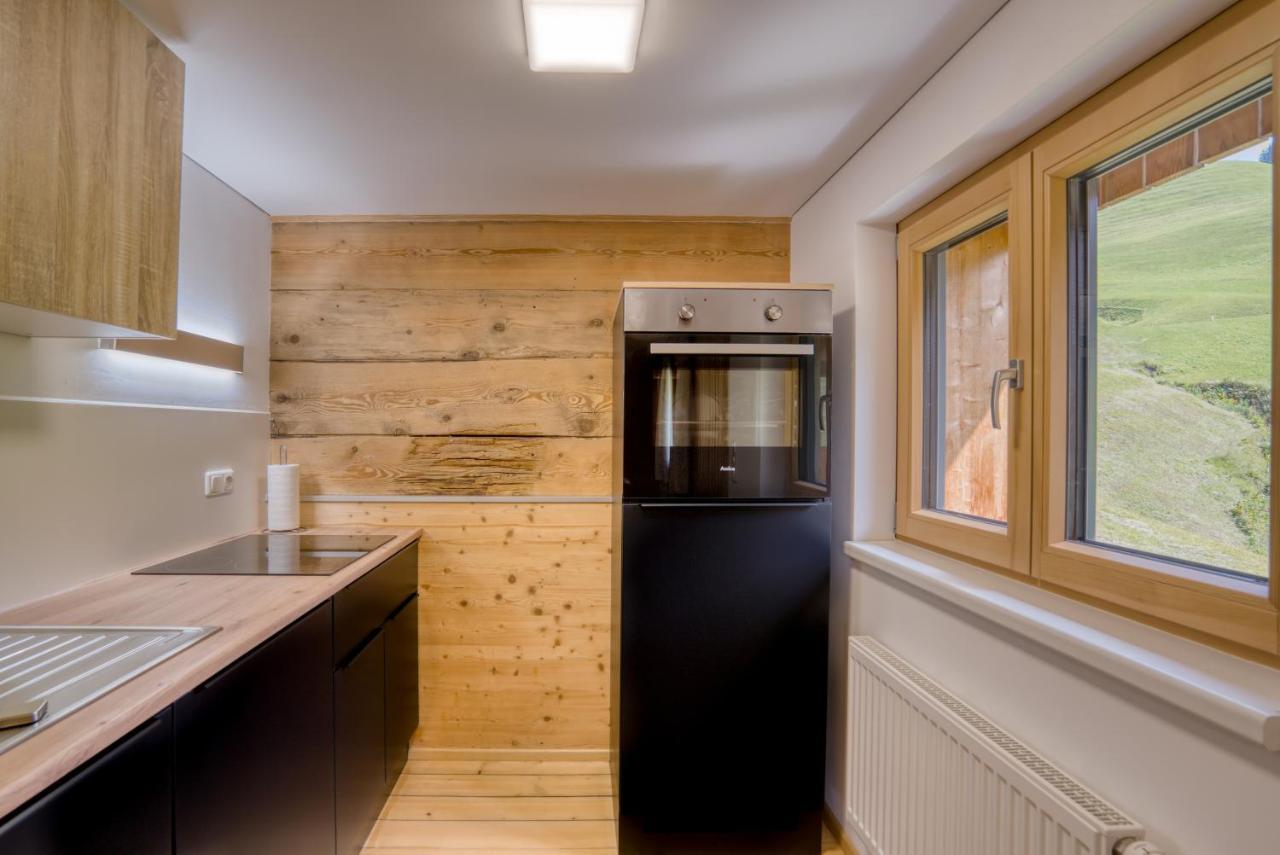 Hus24 Aparthotel Schrocken Bagian luar foto